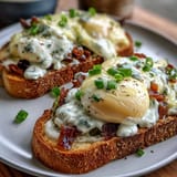 Asparagus and Egg Tartines: Fresh asparagus spears and creamy scrambled eggs on toasted rustic bread, garnished with chives and lemon zest.